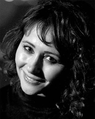 Frances Ruffelle as Ann - Reg's Mum